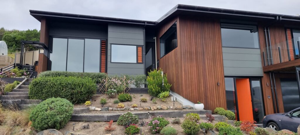 Home showing window film applied for one -way privacy from the street