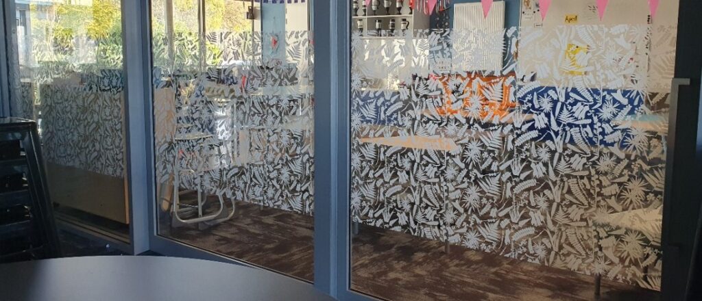 Manifestation throughout rooms to create a visual barrier between rooms for pupils.