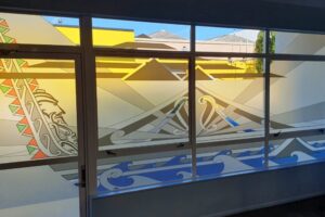 Artwoork by Kinda and completed for Te Roopu Tautoku Ki Te Tonga The artistic journey here is truly remarkable—transforming Kinder's symbolic creativity from an A4 sketch into an amazing glass display